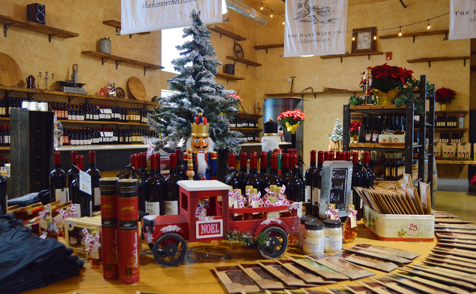 The wine boutique dressed for Christmas, gift sets on the tables